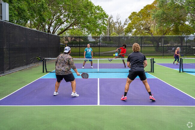 Spend an after-work pickleball game with friends at Cypress Park near Cypress Glen.
