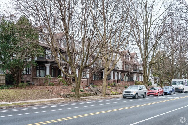Rows of houses with a craftsman feel line a major street in Lancaster's West End area.