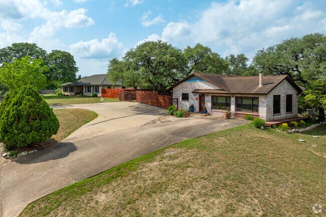 A couple of picturesque ranch homes overlooking Arroyo Doble in Manchaca.