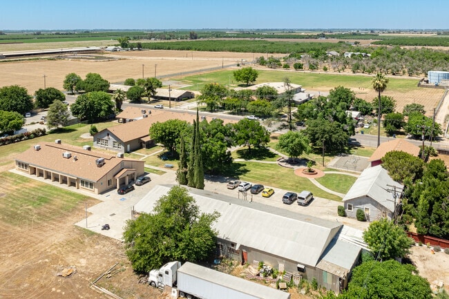 Armona Union Academy provides large green areas and play equipment for students to enjoy.