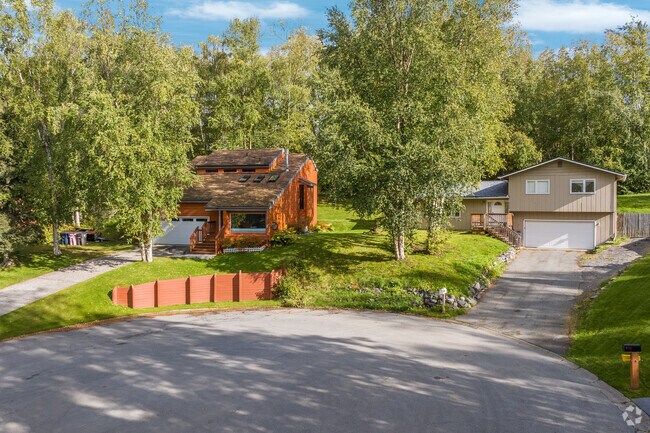 Large trees offer shade and privacy between homes in Scenic Foothills.
