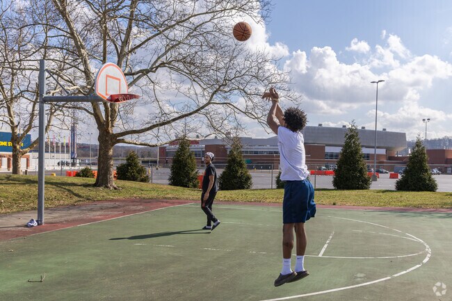 Play a game of basketball with friends at Virginia McNeal Park near Miami Chapel.