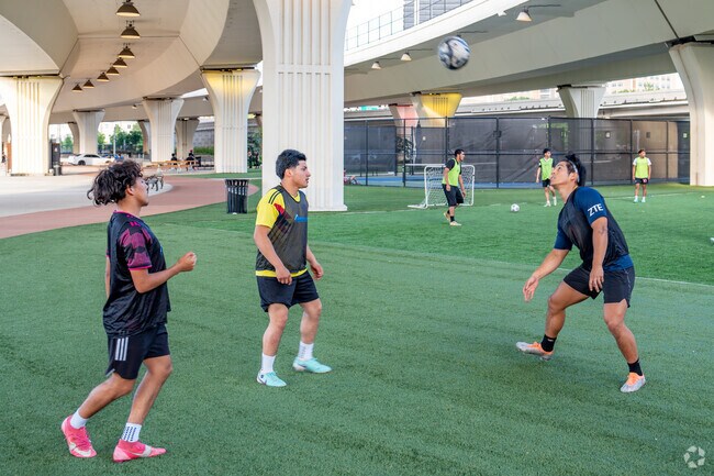 Enjoy a game of keep up at Magic City Futbol at City Walk Park near Sherman Heights.