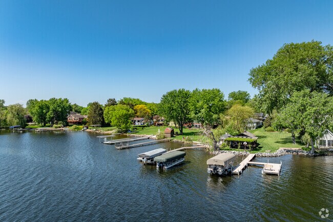 Rows of homes with docks line Long Lake in New Brighton.