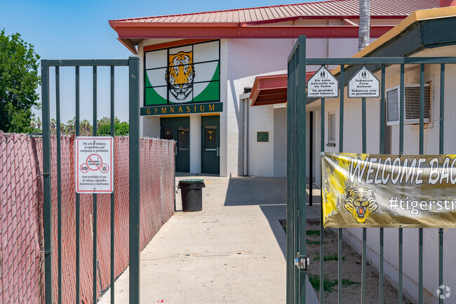 The entrance the gym at Mountain View Middle School is through the gates.