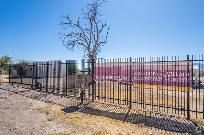 The welcoming sign on the fence of Maricopa Village Adventist School in Laveen.