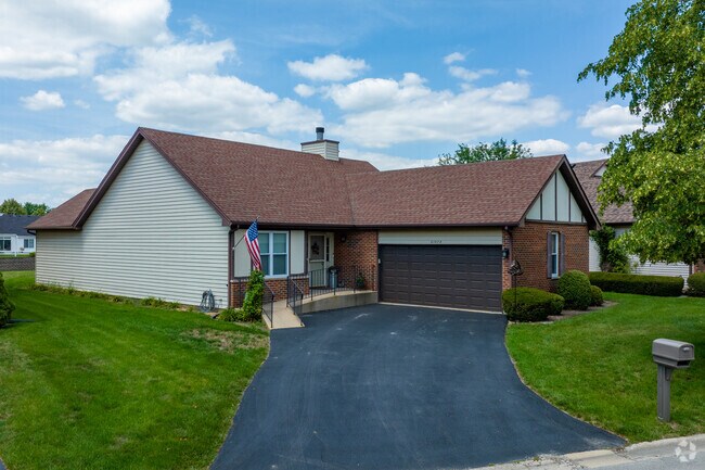 Single family homes in Carillon offer private driveway and attached garages.