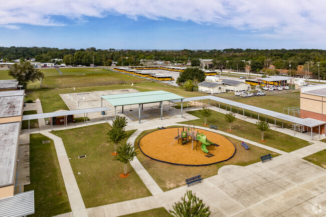 Kids assemble in the recreation area at Eustis Heights Elementary School in Lake County.