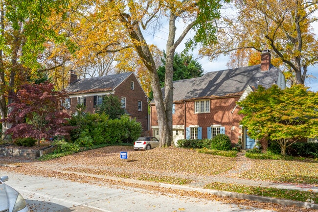 A row of brick colonials on 49th St NW in Spring Valley.