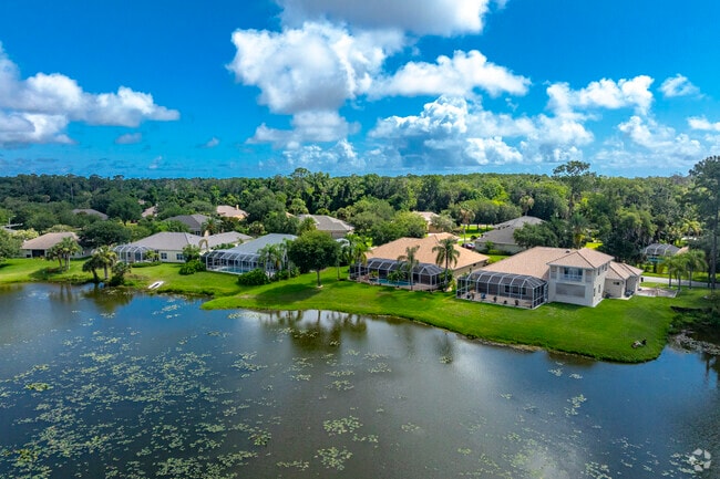 Ormond Lakes estate homes sit upon spacious lots along the water.