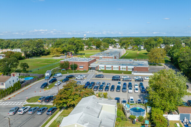 At JFK Elementary School 72% of students are at least proficient in math and 72% in reading.