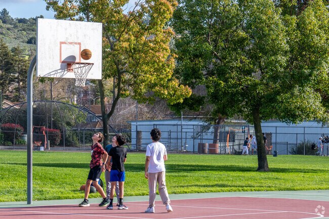 Local kids enjoy the Arroyo Vista Community Park to shoot hoops with their friends in Moorpark.