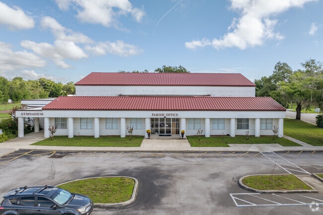 The Parish office is located on the east side of St. Thomas Aquinas Catholic School.