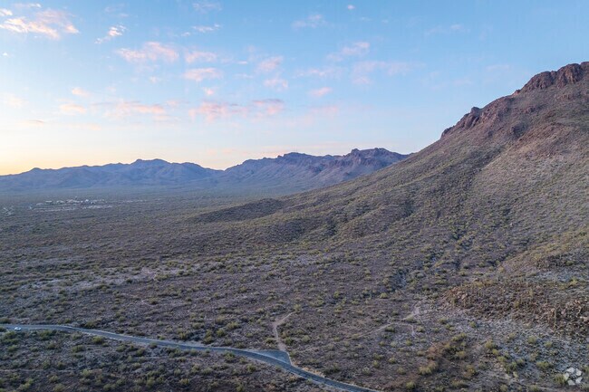 Traveling from Fairgrounds to Old Tucson, drivers are treated to panoramic views of the Sonoran Desert, where the road curves gracefully through a tapestry of cacti and canyons.