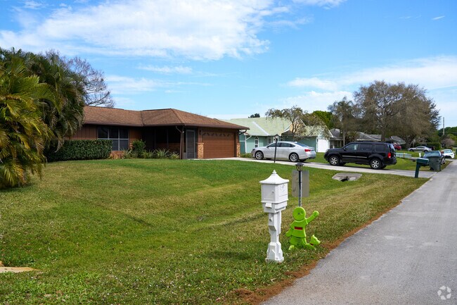 Homes in White City can be seen having ample yard space, perfect for kids to run around on.