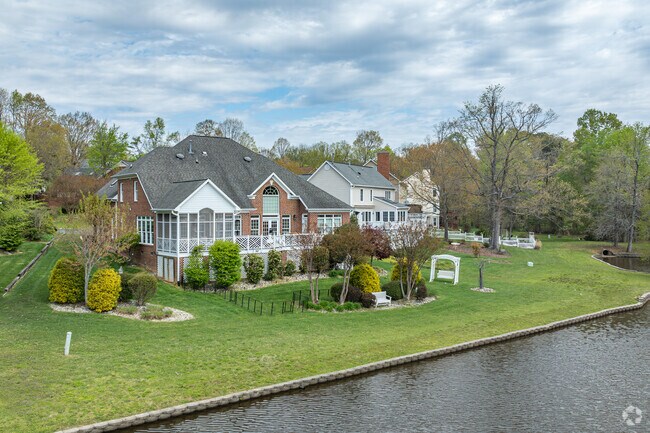 Water lovers can enjoy large homes along the lakeshore in Adams Farm.