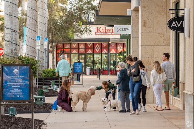 Pelican Marsh neighbors the bustling Mercato shopping center.