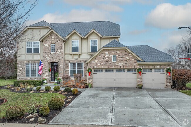 Custom homes with brick work can be seen in Grande Park in Plainfield.