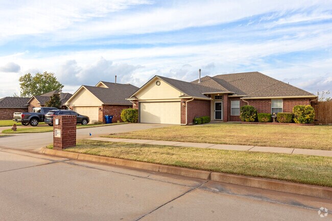 Red brick Traditional homes are a staple of the Mustang area.
