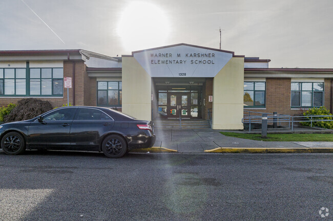 Pickup and drop-off in front of school.