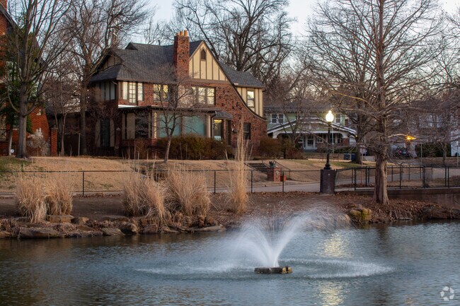 Swan Lake Park lake has a fountain adding character to Swan Lake in Tulsa, OK.