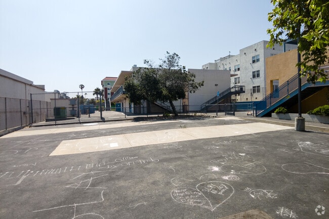 There is a fenced in courtyard at Hobart Boulevard Elementary School in Koreatown.