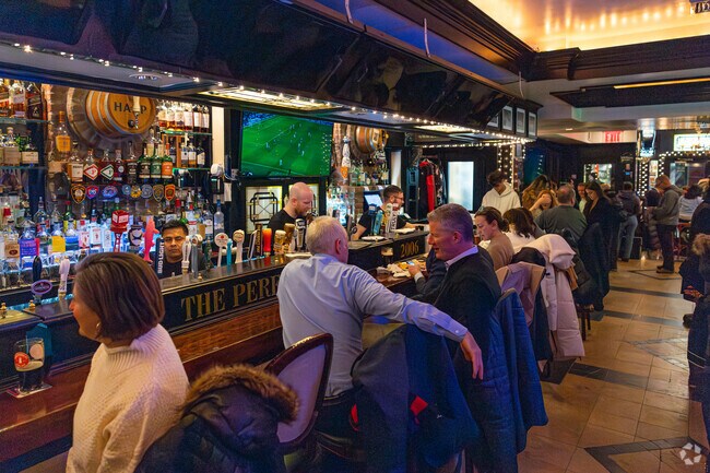 Friends and coworkers meet up at The Perfect Pint in Turtle Bay.