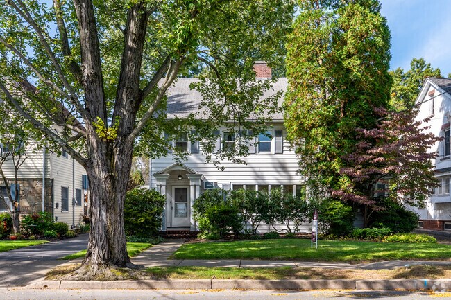 Beautiful colonial homes sit in the shade in Kingston neighborhoods.