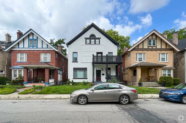 Large houses with lush yards line the suburban streets of Olde Towne East.
