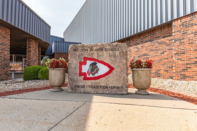 Mt. Zion Junior High School's Braves logo located at the main entrance.