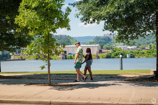City Center locals find the shaded pathways a nice respite from the summer heat.