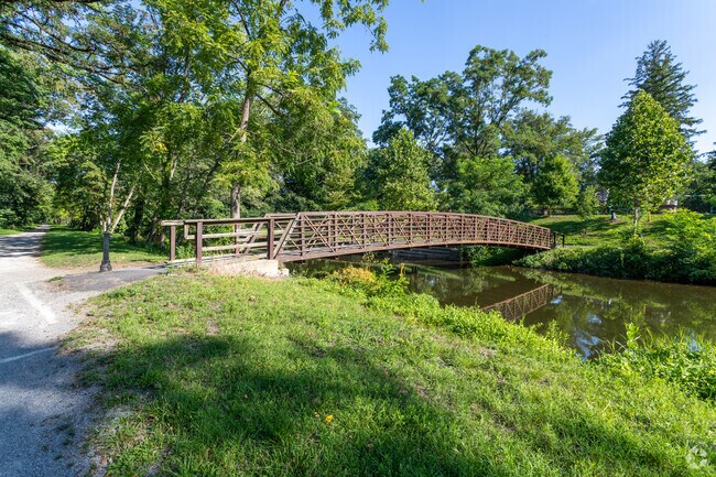A bridge runs over the canal at Cadwalader Park in the Cadwalader & Hillcrest neighborhood.
