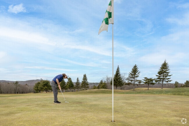 Practice your short game at The Meadows Golf Club in Wales.