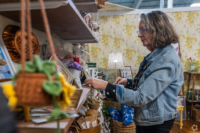 The Yellow Door offers handmade gifts, vintage finds, and local art.