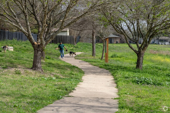 Locals in Harris Branch can make use of miles of trails for dog walks.