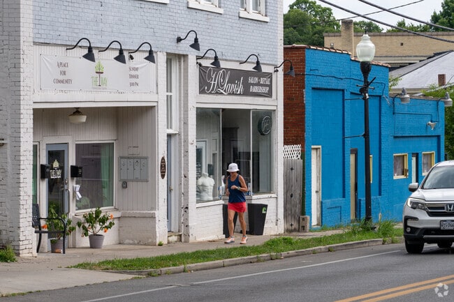 Residents stroll or jog throughout Hurt Park.