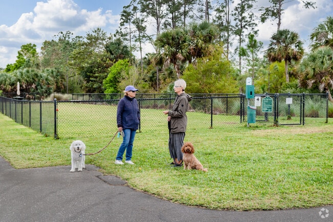 Winding Cypress has a dog park with two separate areas for dogs of different sizes.