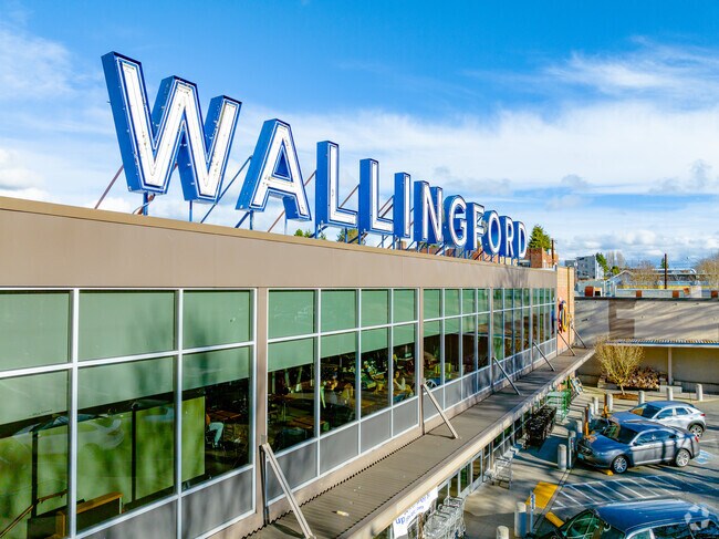 The Wallingford Sign sits atop QFC at the intersection of N 45th Street and Wallingford Ave N.