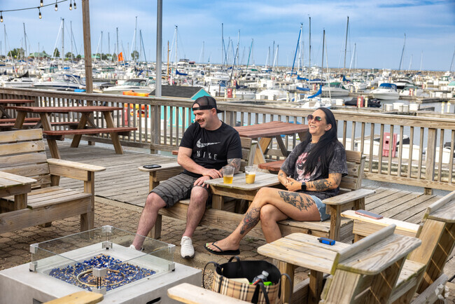 Harbor Brewing Co. Lakefront Biergarten offers a vibrant lakeside scene, near Hermon.