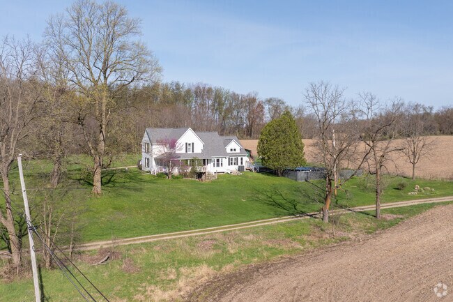 Most of the homes in Bowne Township are farmhouses on acres of land between farmland.