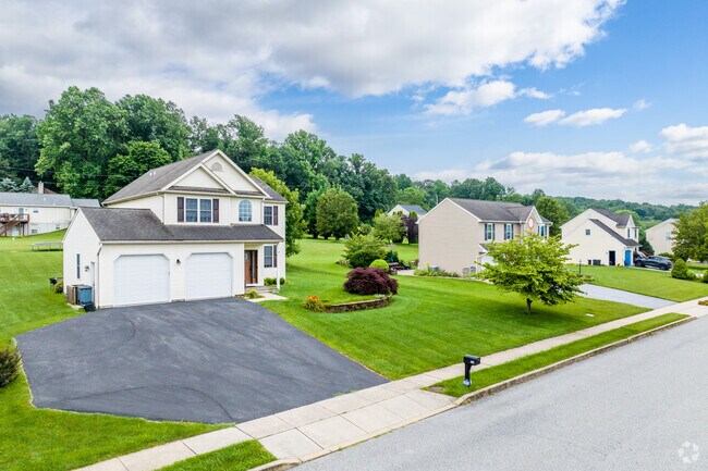 Sadsbury Township includes newer housing developments featuring modern Colonial-style homes.
