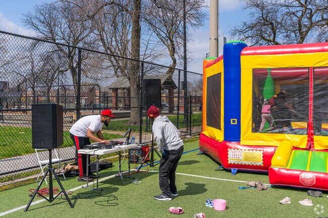 DJs spin tunes at the Easter Egg Hunt in Garfield Park.