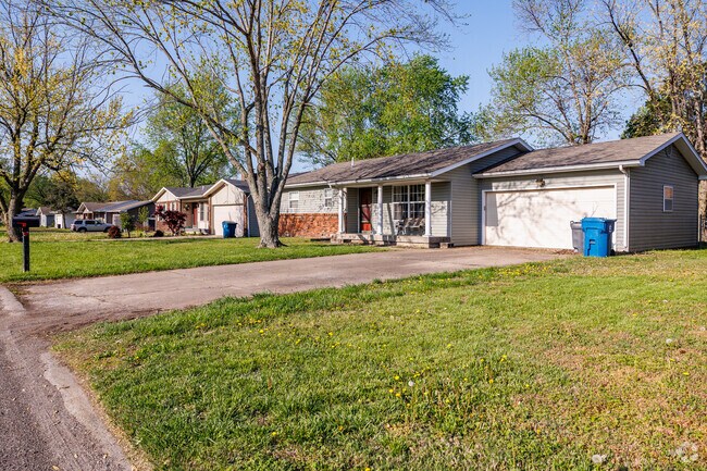 Ranch homes line a residential street in Kelsey Norman South.