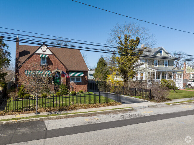 Cape style homes are nestled on the quiet streets of Islip, NY.