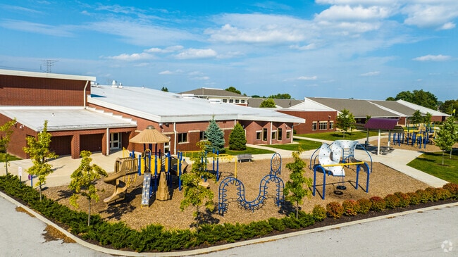 Eagle Creek Elementary School boasts a large playset for recess fun.
