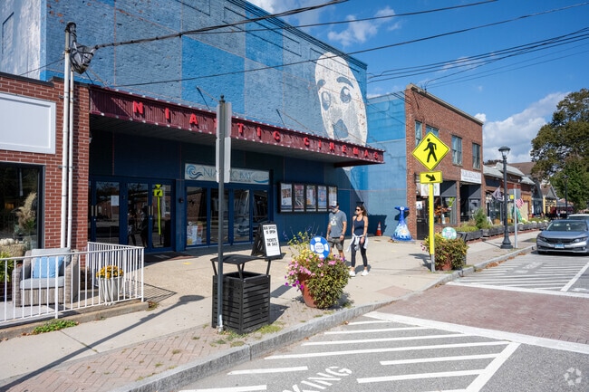 A couple enjoying the walkability of Main Street in East Lyme.