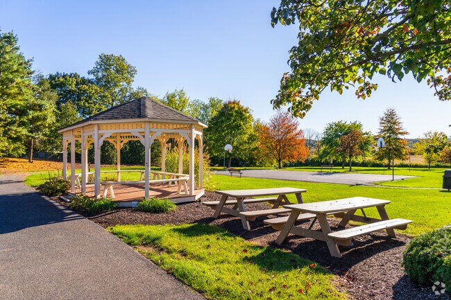 Quail Hollow Recreation Area includes a gazebo and tables perfect for weekend picnics.