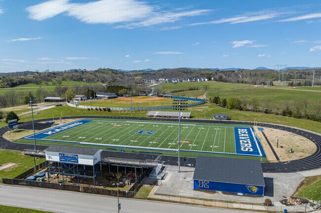 The Karns High School Beavers play on a beautiful football field.