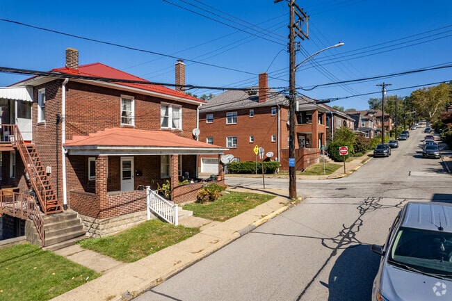 Foursquare homes are up and down the hilly streets of Forest Hills.