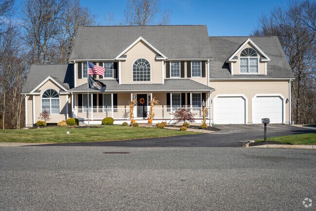 Admire stunning millennial mansions in the Monastery Heights neighborhood, RI.